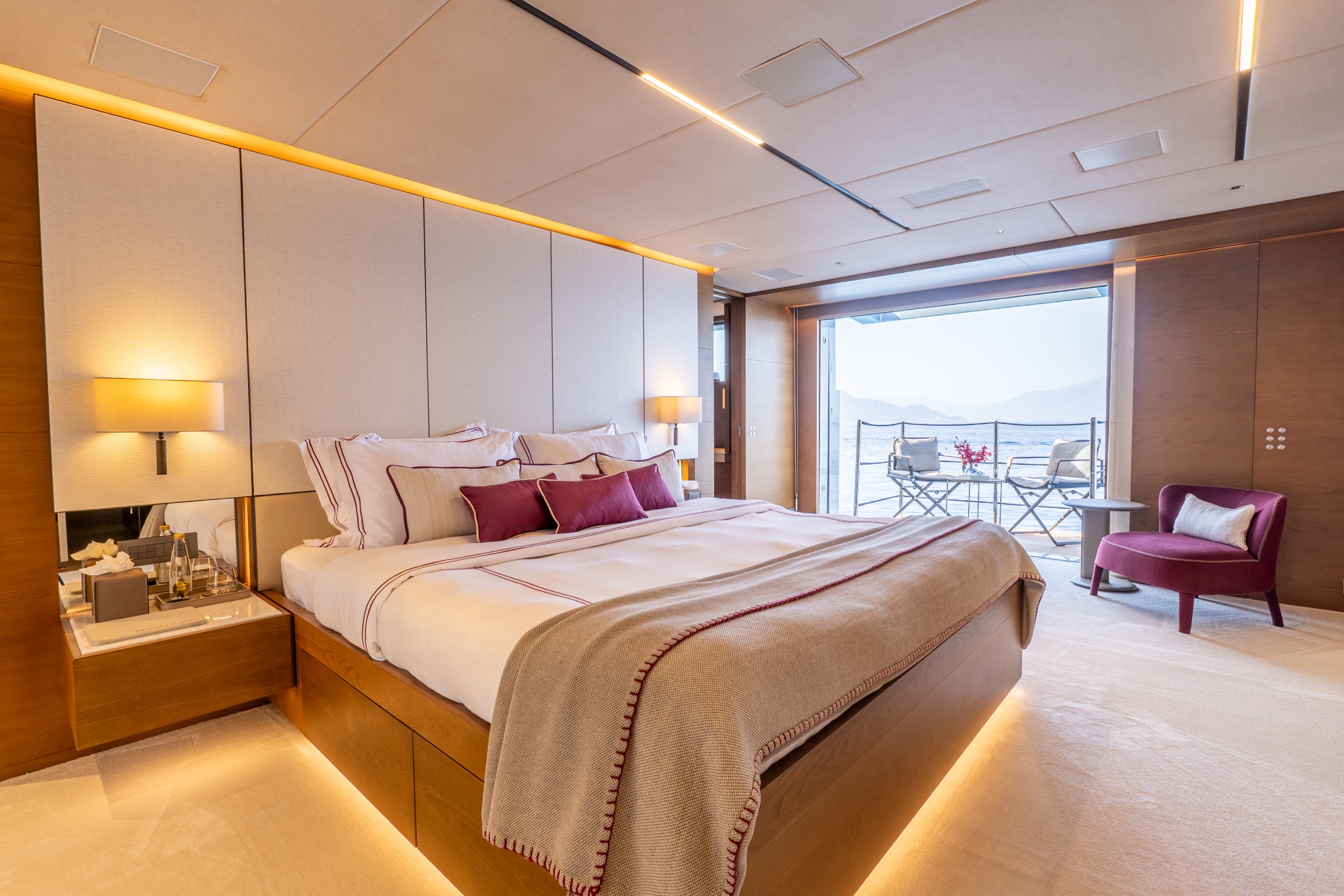 M/Y Naia Master suite — Hot Lab Studio Milan 2024 refit with hull windows and contemporary marble
